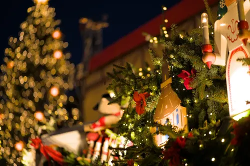 Christmas decorations hang on a tree in Dresden Xmas market