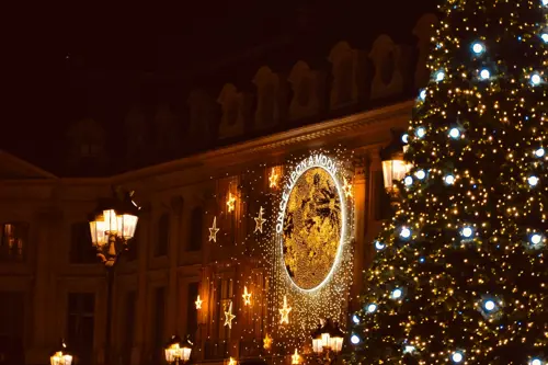 Festive christmas lights in a courtyard in Paris