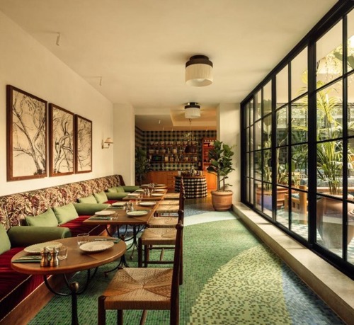 Indoor seating Oscars beside courtyard
